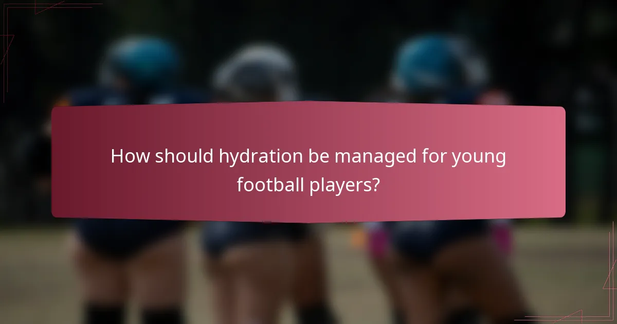 How should hydration be managed for young football players?